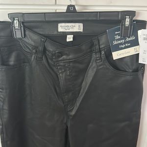 The super skinny ankle high rise 31/12L curve love crisscross waist